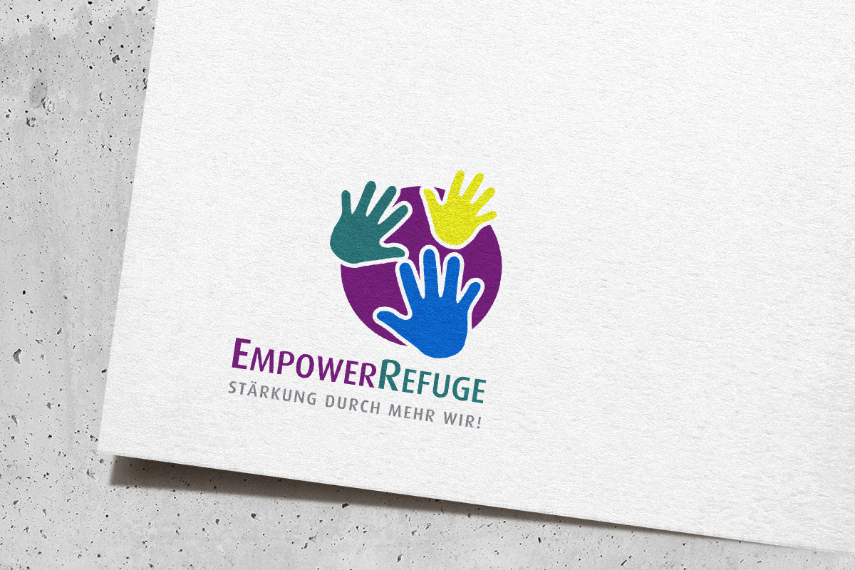 The 'EmpowerRefuge' logo is a straightforward representation of the 'leaving an impact' concept.